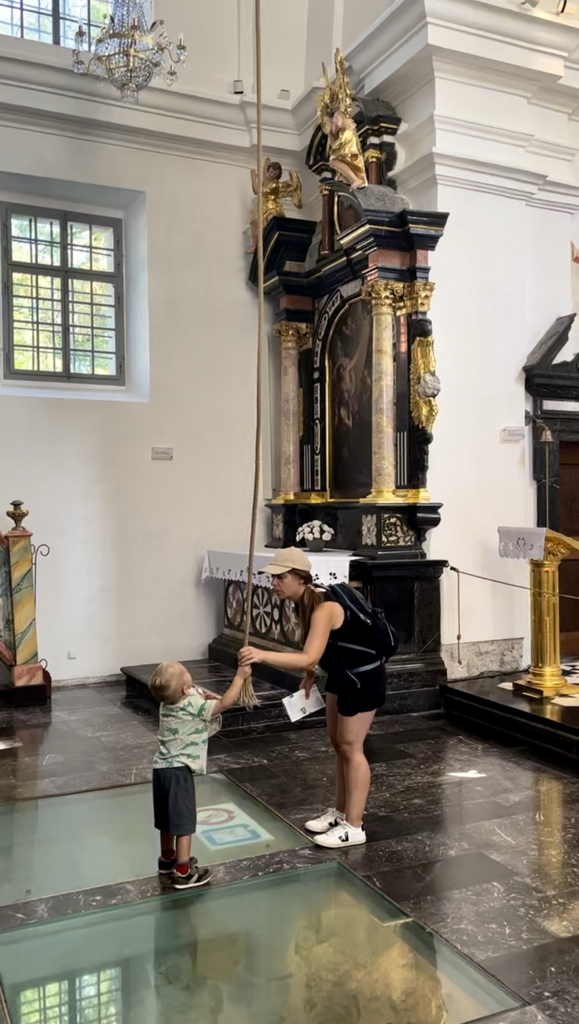 ringing the bell inside church on island of Lake Bled