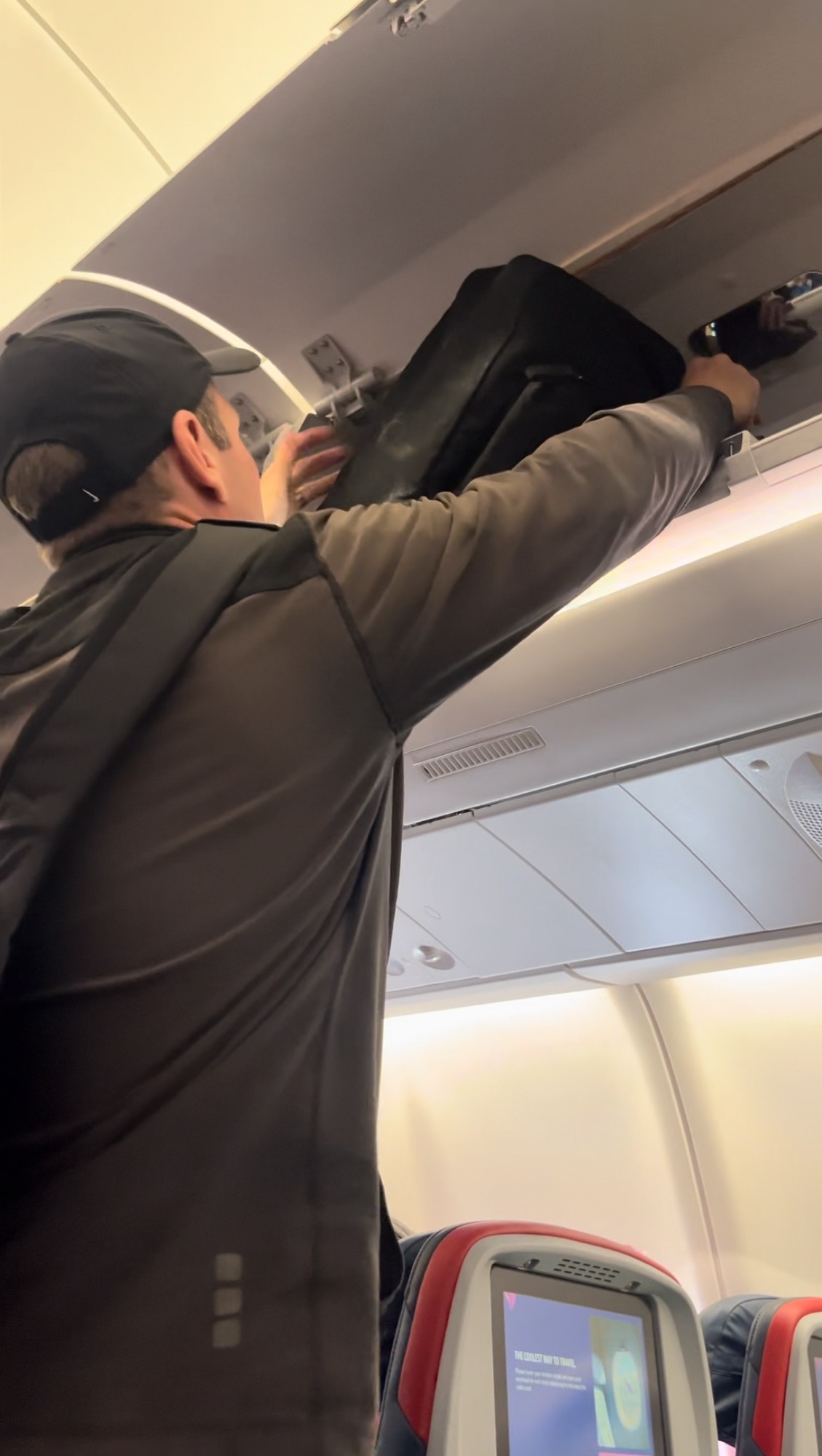 putting the gb pockit stroller in the overhead bin on our flight